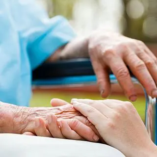 Nurse checking vital signs during a home visit